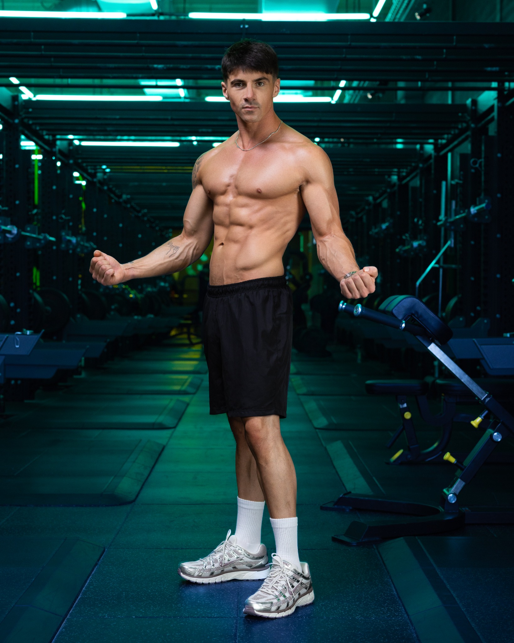 Jayke Izli standing in a studio gym